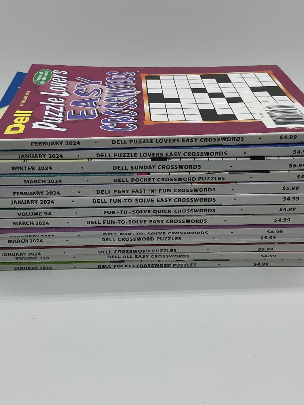 Lot of 13 Dell Crossword Puzzle Magazines